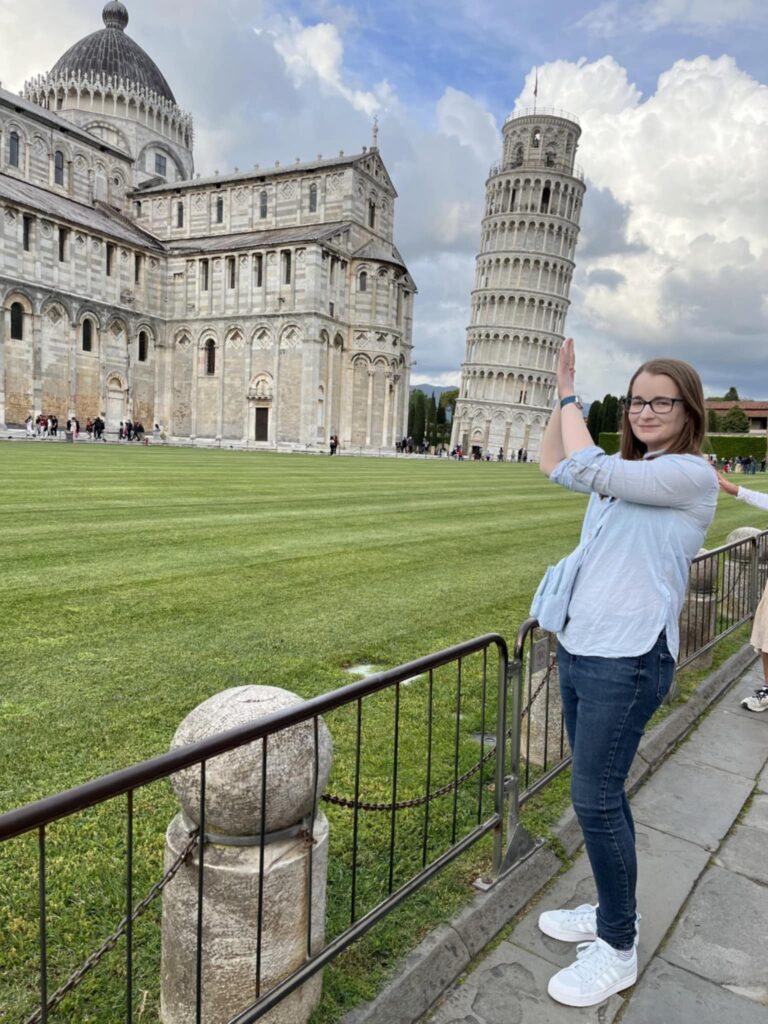 me holding up the leaning tower of pisa